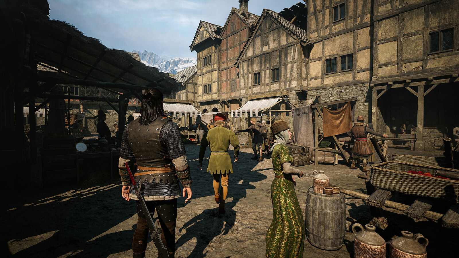 Official Steam screenshot for The Blood of Dawnwalker by Rebel Wolves and Bandai Namco. Coen walks a sunlit Vale Sangora market while mountains cut the sky.