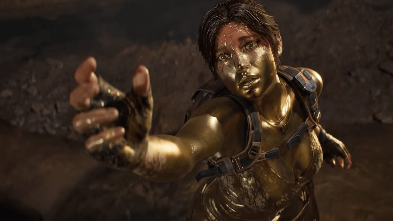 Lara Croft turned to gold by the Midas hand in the Tomb Raider: Legacy of Atlantis 30th anniversary teaser (Amazon Game Studios, Crystal Dynamics, Flying Wild Hog, via Gematsu).